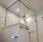 bathroom with split glass shower doors