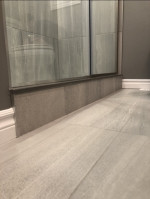 bathroom floor tiles and glass shower doors