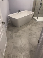 bathroom with deep freestanding tub