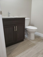 bathroom with tile floor and toilet