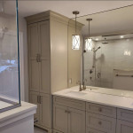 bathroom vanity countertop with counter-to-ceiling mirror and pendant lamp