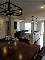dining room with chandelier and kitchen center island