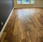 dark textured wood flooring in a family room
