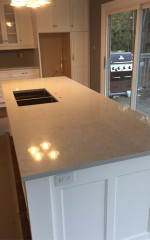kitchen with double recessed sink in center island